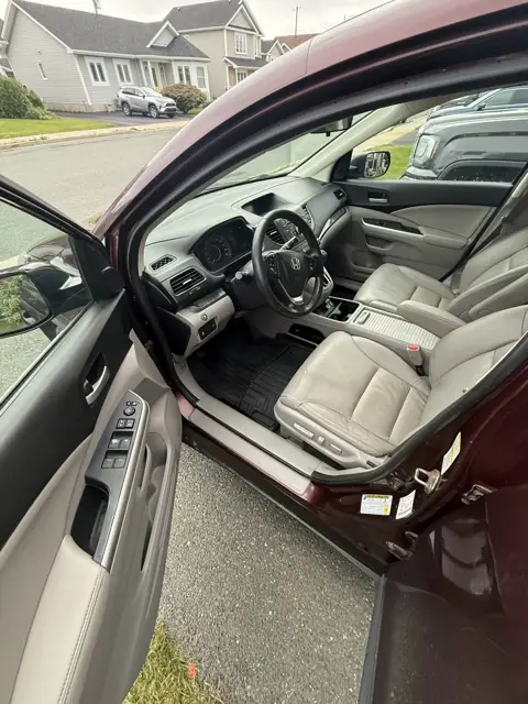 Maroon SUV, leather interior refresh
