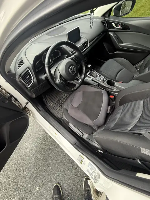 White hatchback, inside and out